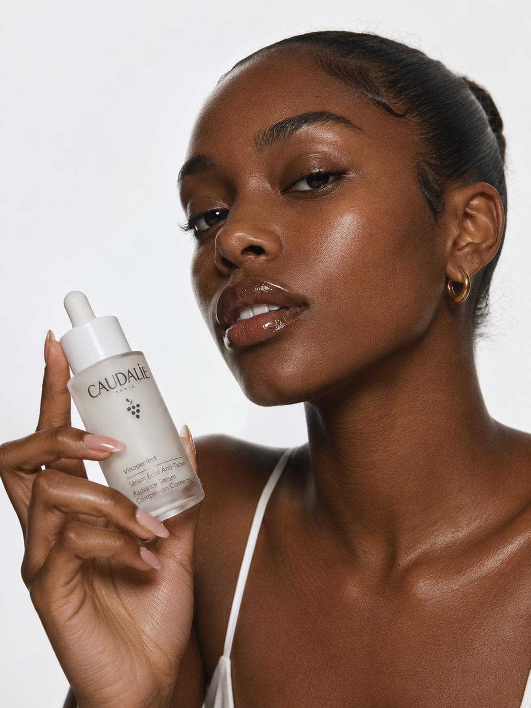 AI-generated luxury skincare and beauty product visuals with studio-quality lighting — Adject